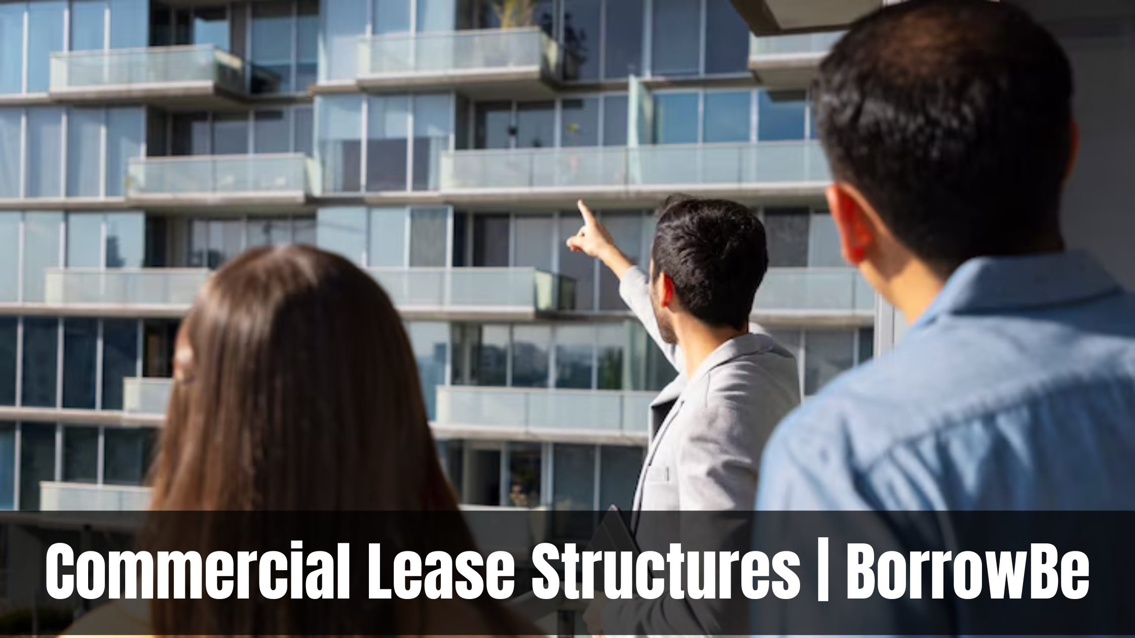 Man in a suit points at a modern glass building, observed by two people. The mood is professional and informative. Text: “Commercial Lease Structures | BorrowBe.”
